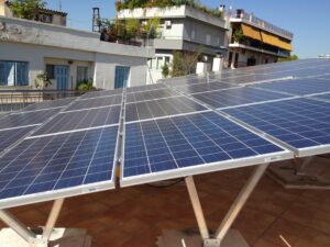 Photovoltaic (pv) solar panel roof of 10 kWatts anchored above counterweights at Athens
