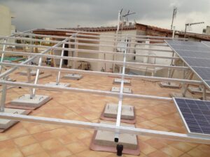 Photovoltaic (pv) solar panel roof of 10 kWatts anchored above counterweights at Athens