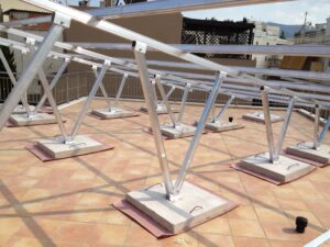 Photovoltaic (pv) solar panel roof of 10 kWatts anchored above counterweights at Athens
