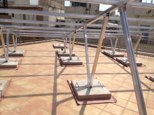 Photovoltaic (pv) solar panel roof of 10 kWatts anchored above counterweights at Athens
