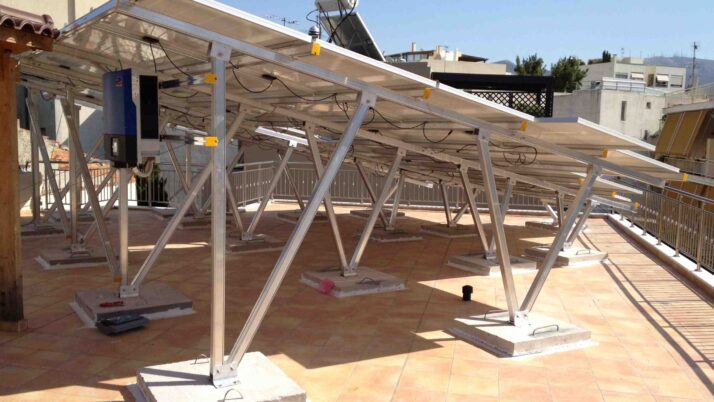 Photovoltaic (pv) solar panel roof of 10 kWatts anchored above counterweights at Athens
