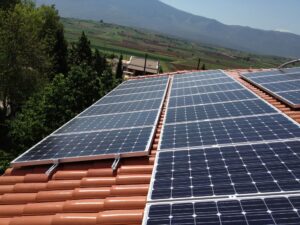 Photovoltaic (pv) solar panels on a tile roof with a rated power of 9.99 kWatts at Thebes