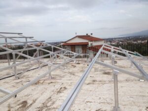 Photovoltaic solar panel roof with a rated power of 9.8 kWatts at Aigio