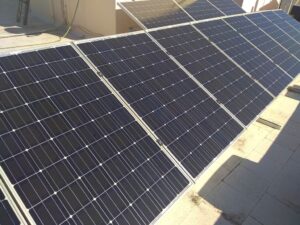 Photovoltaic solar panel flat roof system at Athens